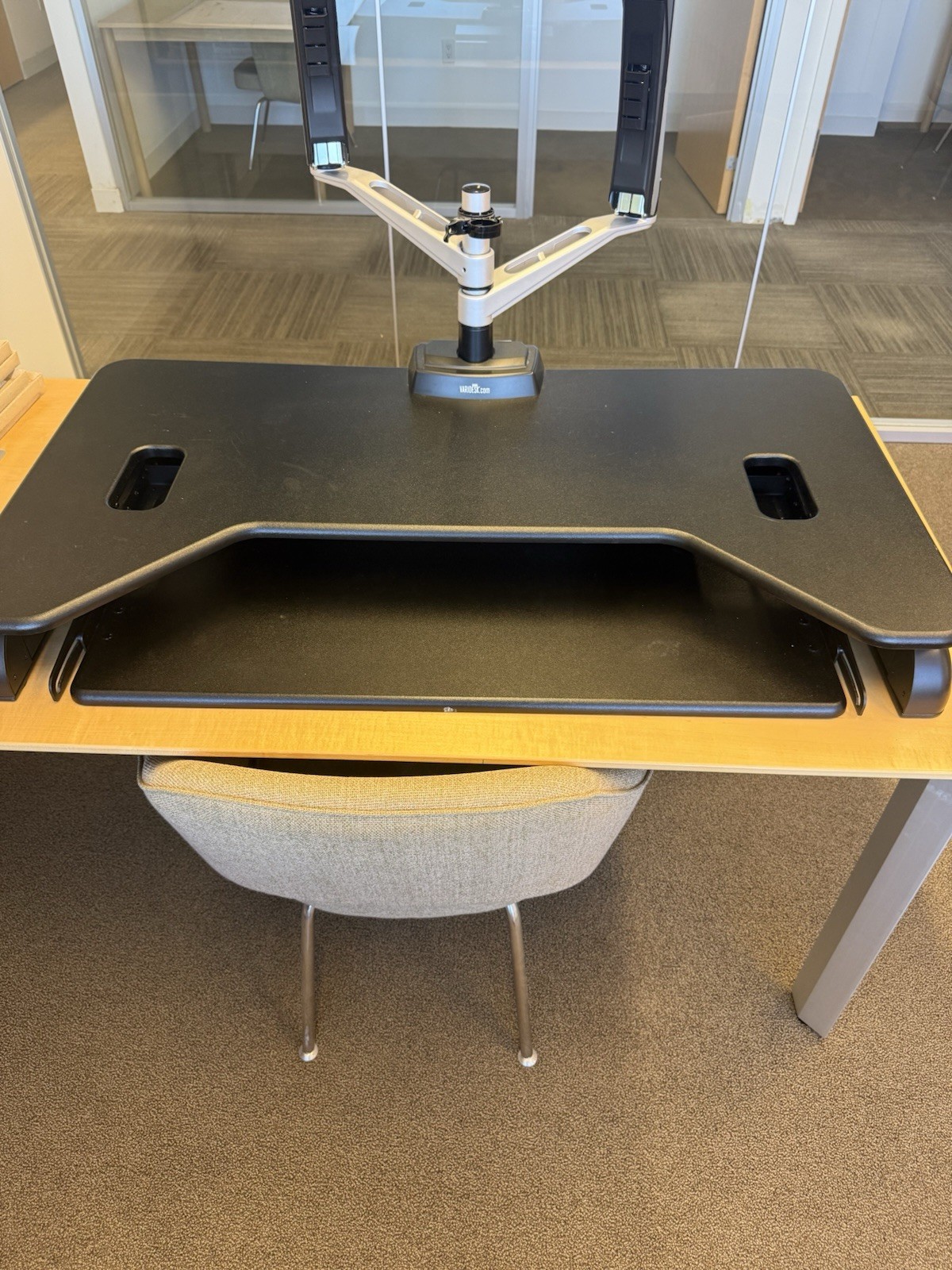 This is a VariDesk Cube Plus 40 standing desk converter in black