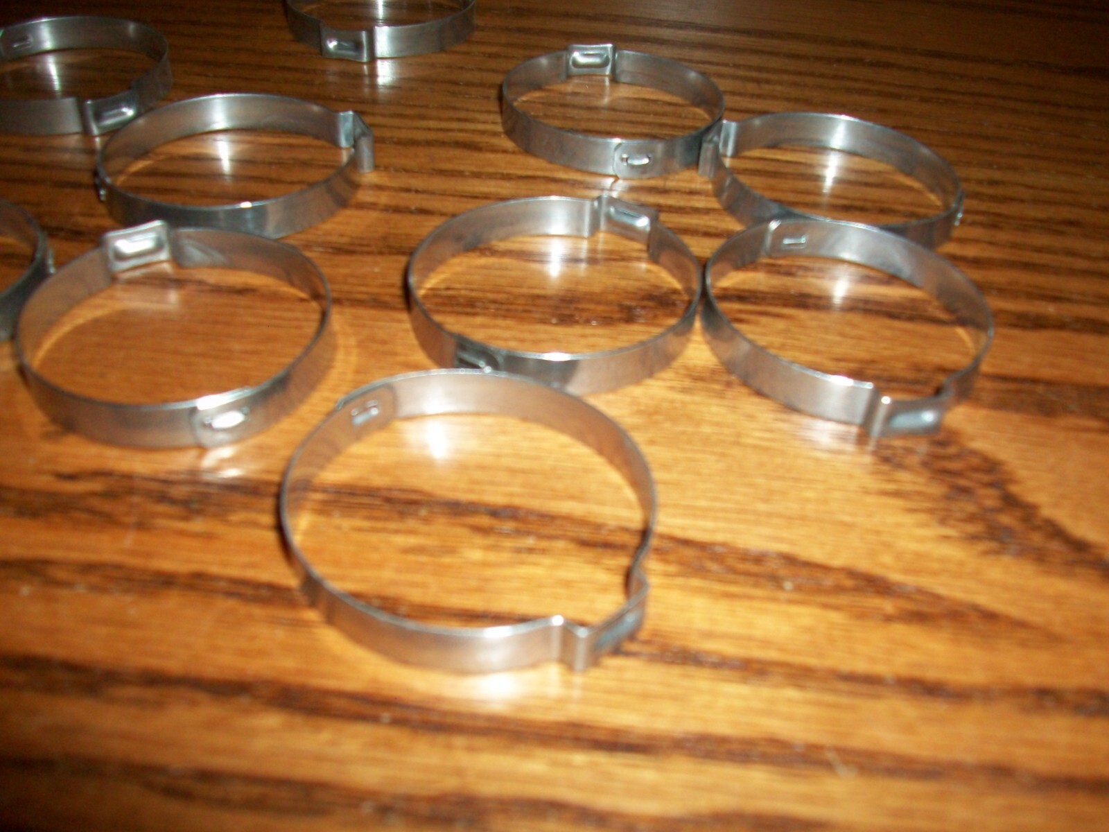 Lot of 10 Oetiker 1.25″ 1-1/4″ Stepless Stainless Hose Clamp- one ear==15500027