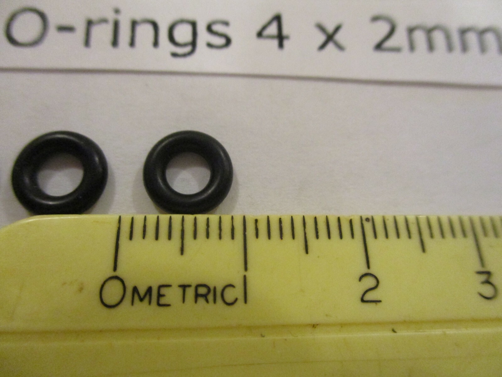 4mm ID x 8mm OD x 2mm thick O-ring. Buna-70. Quan 5.