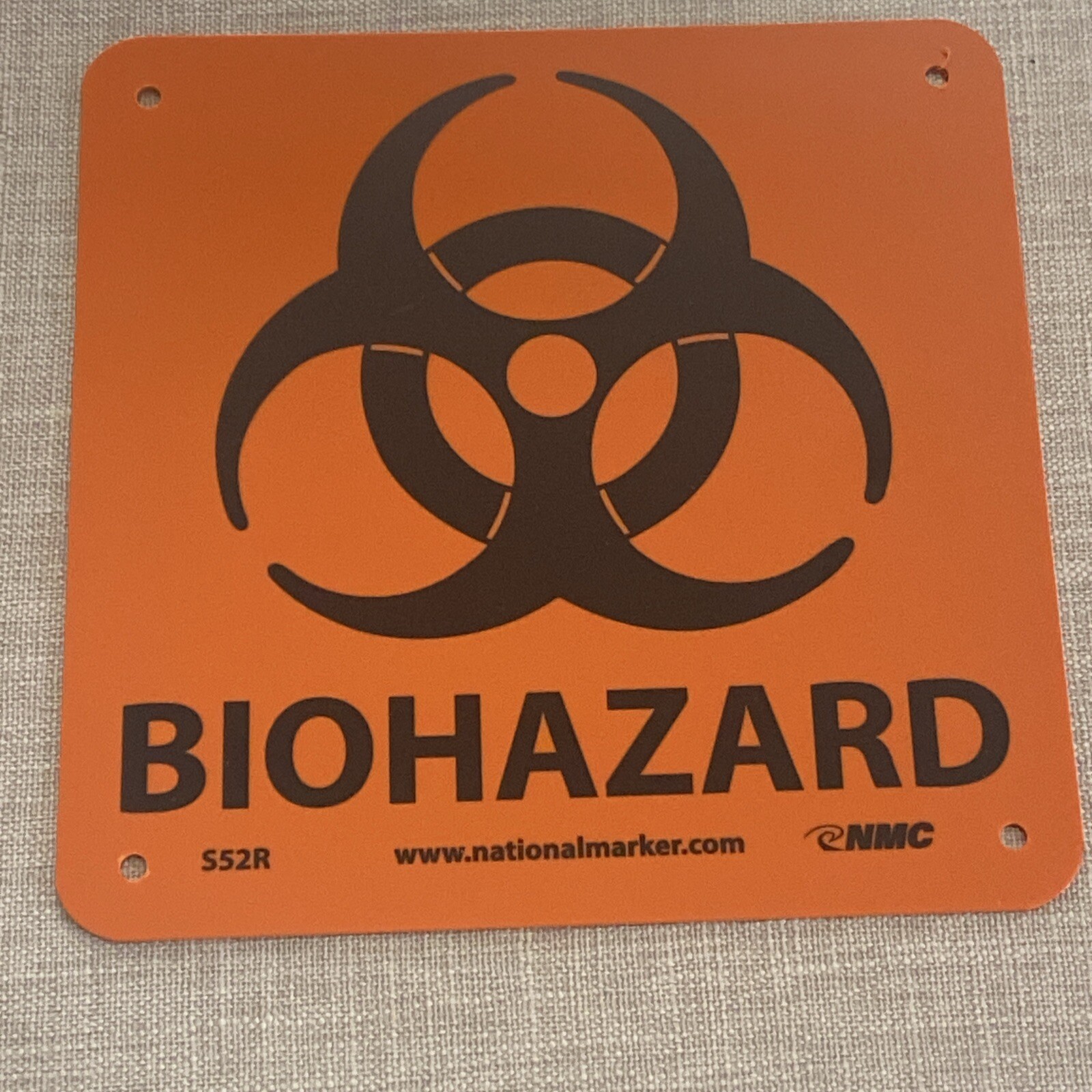 Biohazard 7 in. x 7 in. Plastic Sign with Graphic, Black Text on Orange Base