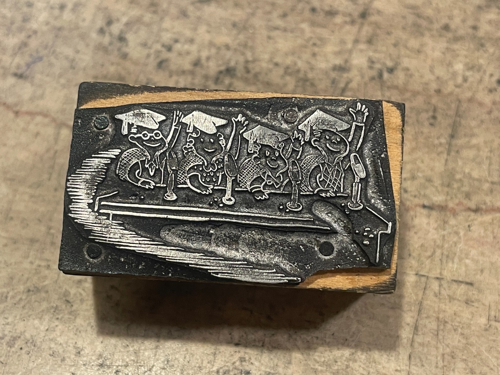 Printing Letterpress Printers Block Graduates At Microphones Raising Hand (1275)