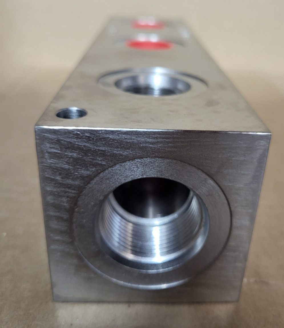 Hydraulic Manifold Block 10″ x 2 1/2″ With 8 ports 2 one inch , 6 are 3/4″ npt