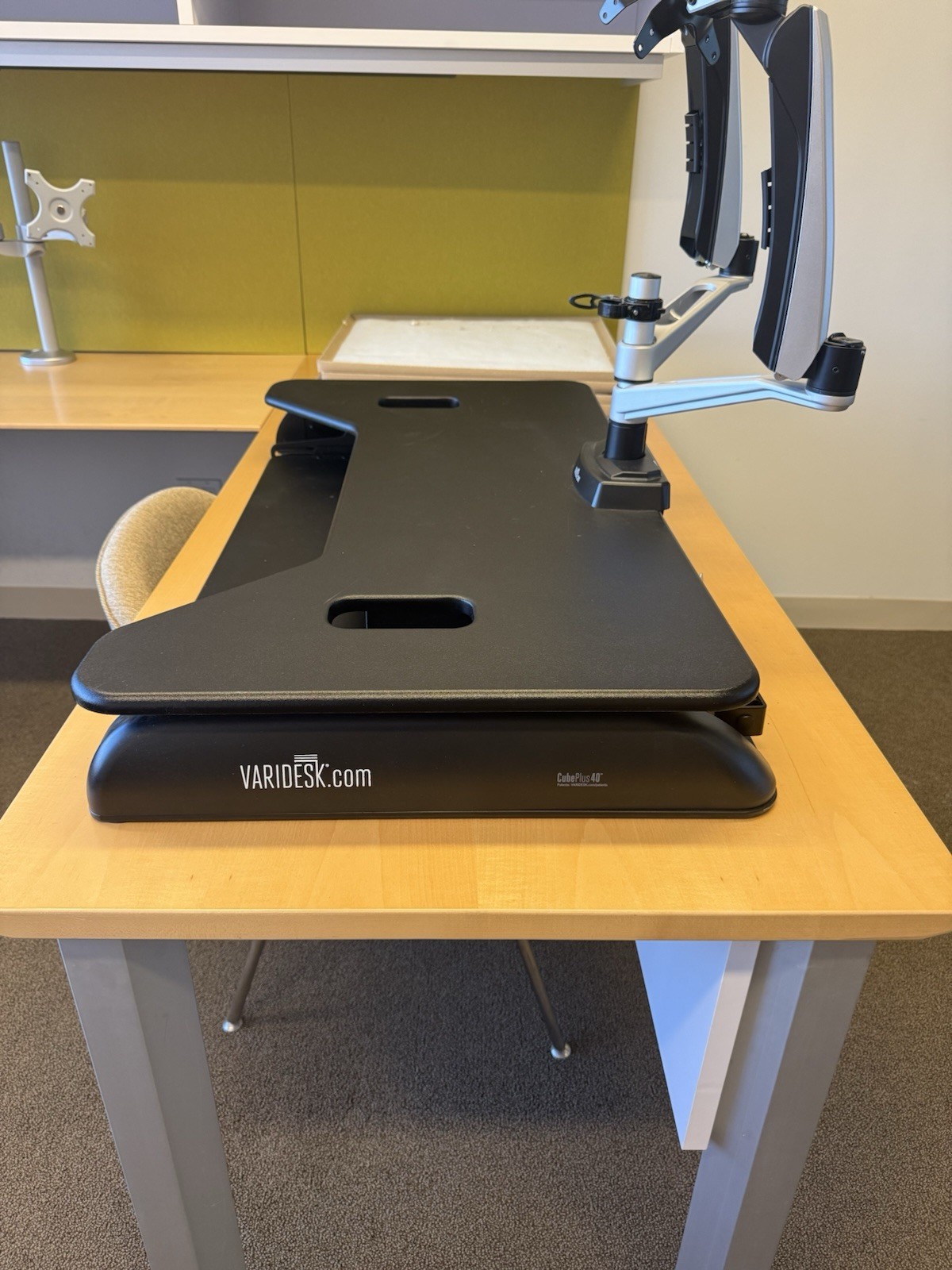 This is a VariDesk Cube Plus 40 standing desk converter in black