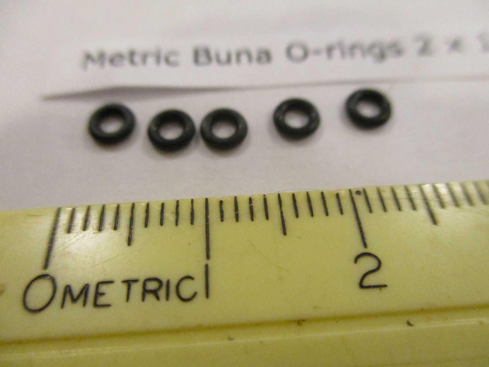 2mm ID x 4mm OD x 1mm thick O-ring. Buna-70. Quan 5..