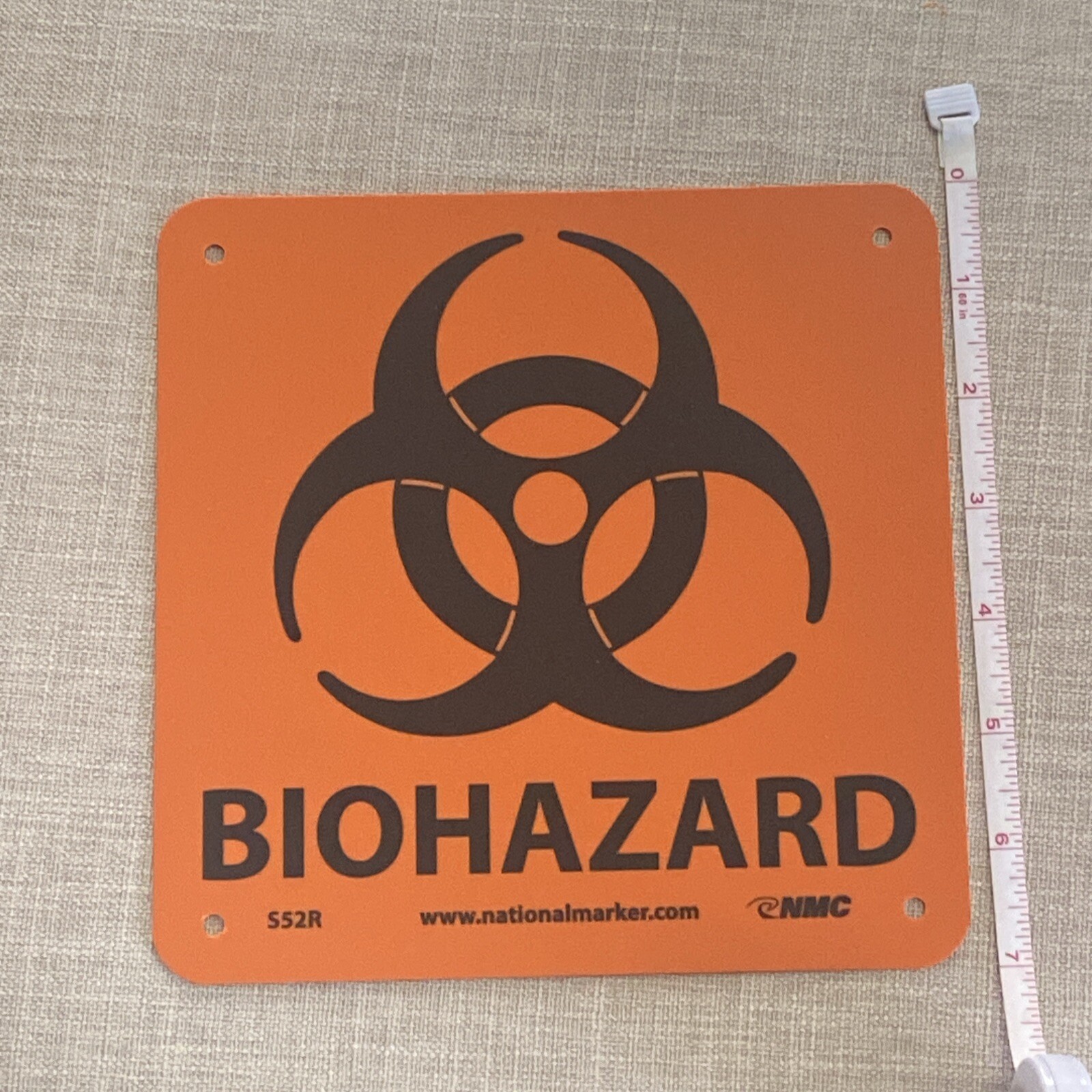 Biohazard 7 in. x 7 in. Plastic Sign with Graphic, Black Text on Orange Base