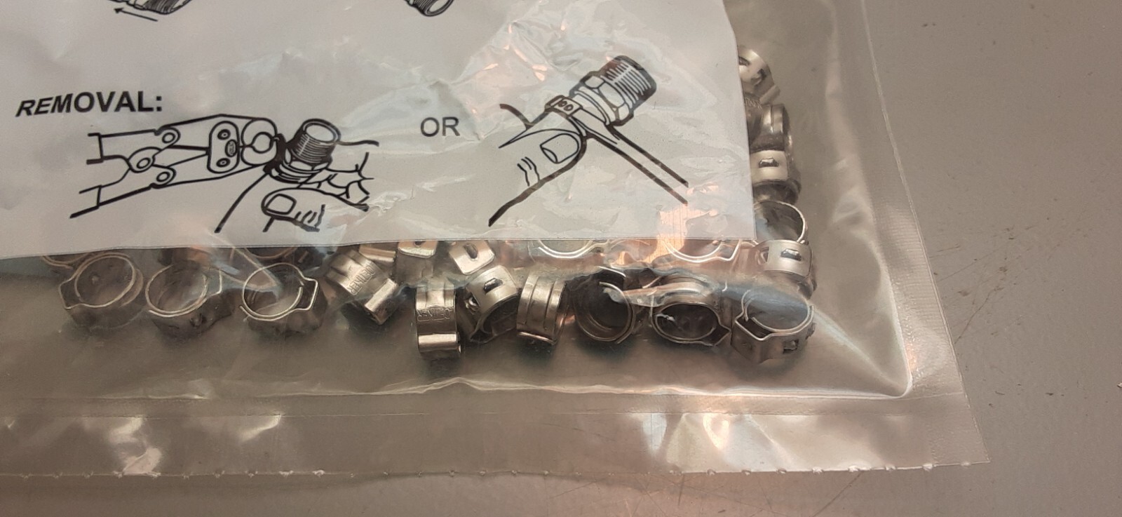 Oetiker Stepless Ear Clamp, One Ear 5mm,5.8mm (Closed)-7mm(Open)(100 pk) 1670001