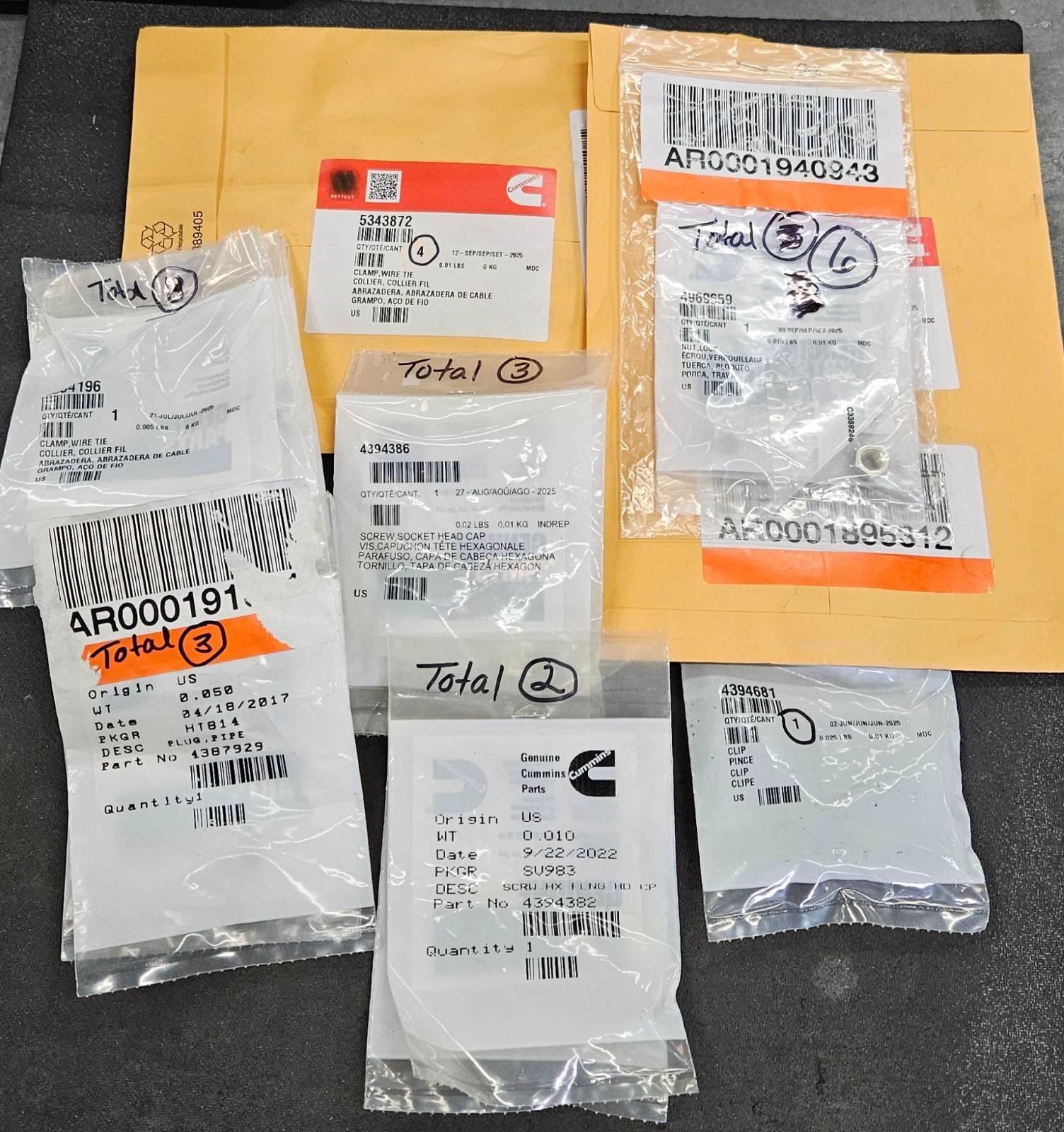 LOT OF MISC CUMMINS PARTS/ CLIPS,CLAMPS,SCREWS, PLUGS- **SEE PICTURES** (MSC)
