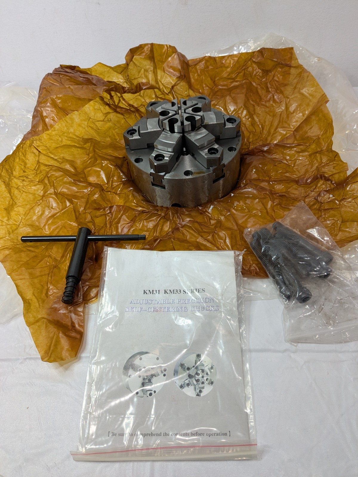 Interstate Manual Lathe Chuck 6-19/64″ 6 Jaws Self-Centering Plain Back 08600355