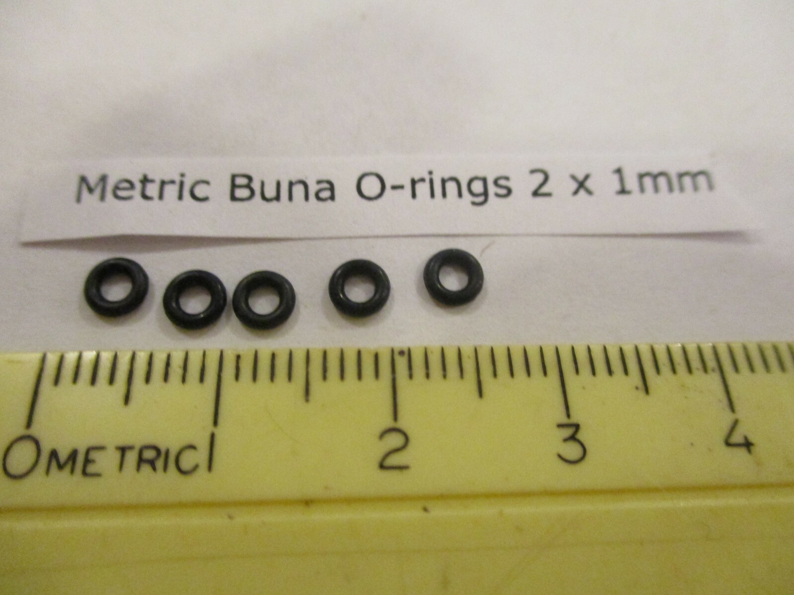 2mm ID x 4mm OD x 1mm thick O-ring. Buna-70. Quan 5..