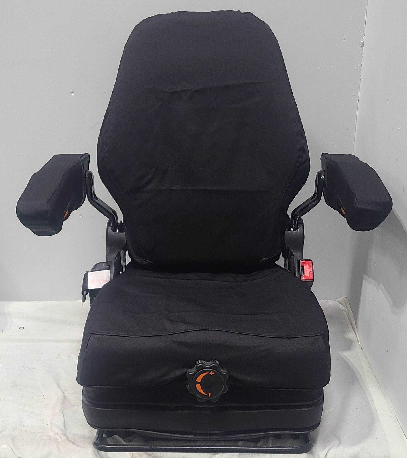 Forklift & Tractor Suspension Seat with Adjustable Armrest Made in Black Endura.