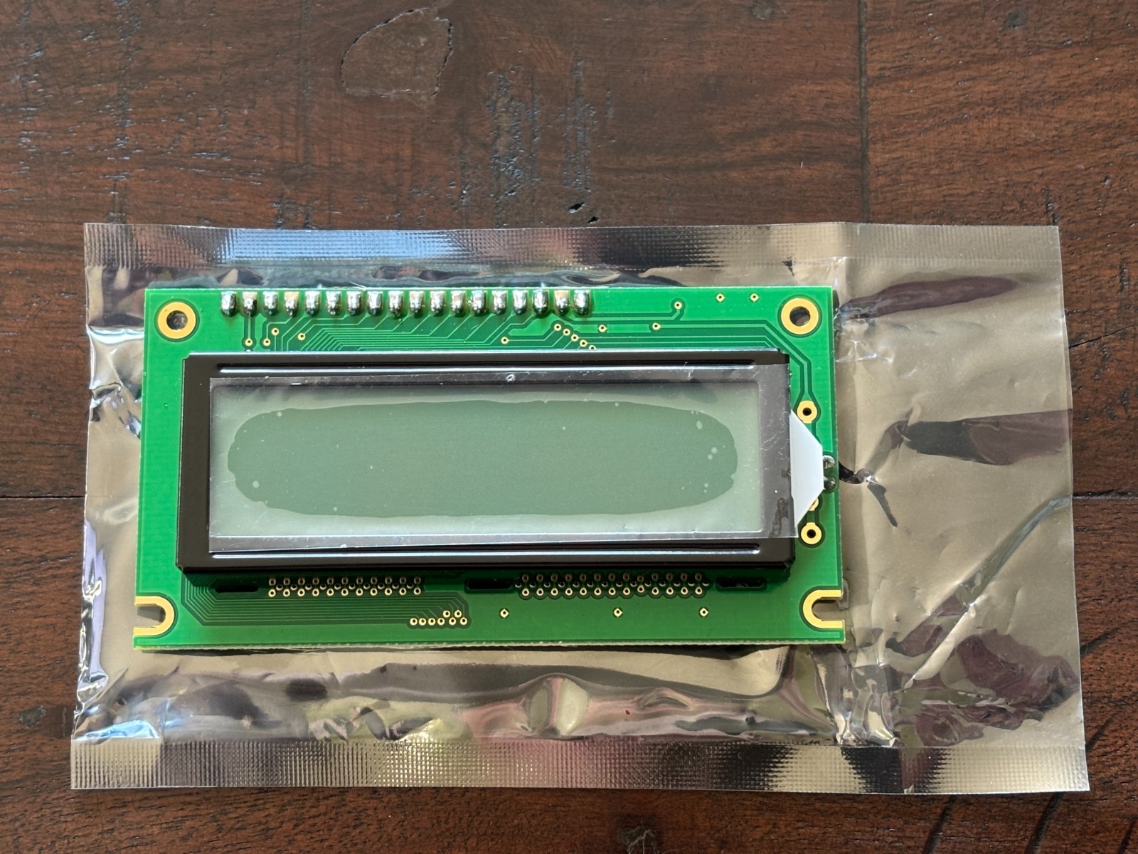 Newhaven Display 122×32 Graphic LCD / 5.0V STN+ Yellow-Green / Yellow-Green Back