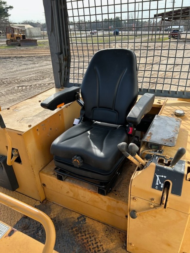 Forklift & Tractor Suspension Seat with Adjustable Armrest Made in Black Endura.