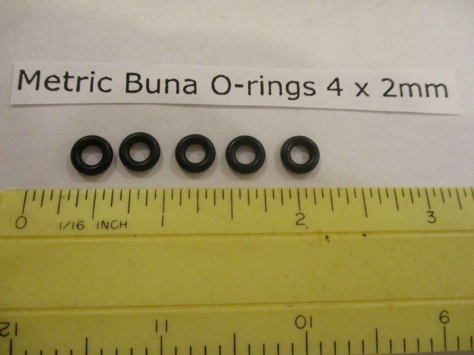 4mm ID x 8mm OD x 2mm thick O-ring. Buna-70. Quan 5.