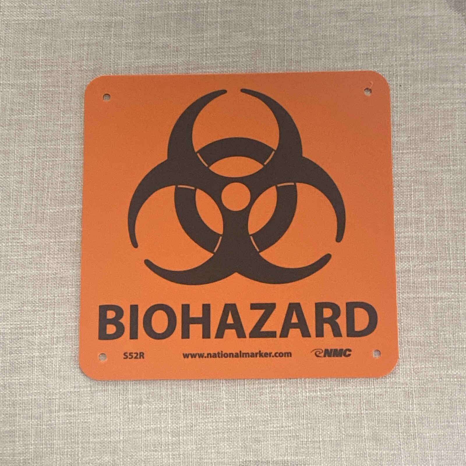 Biohazard 7 in. x 7 in. Plastic Sign with Graphic, Black Text on Orange Base