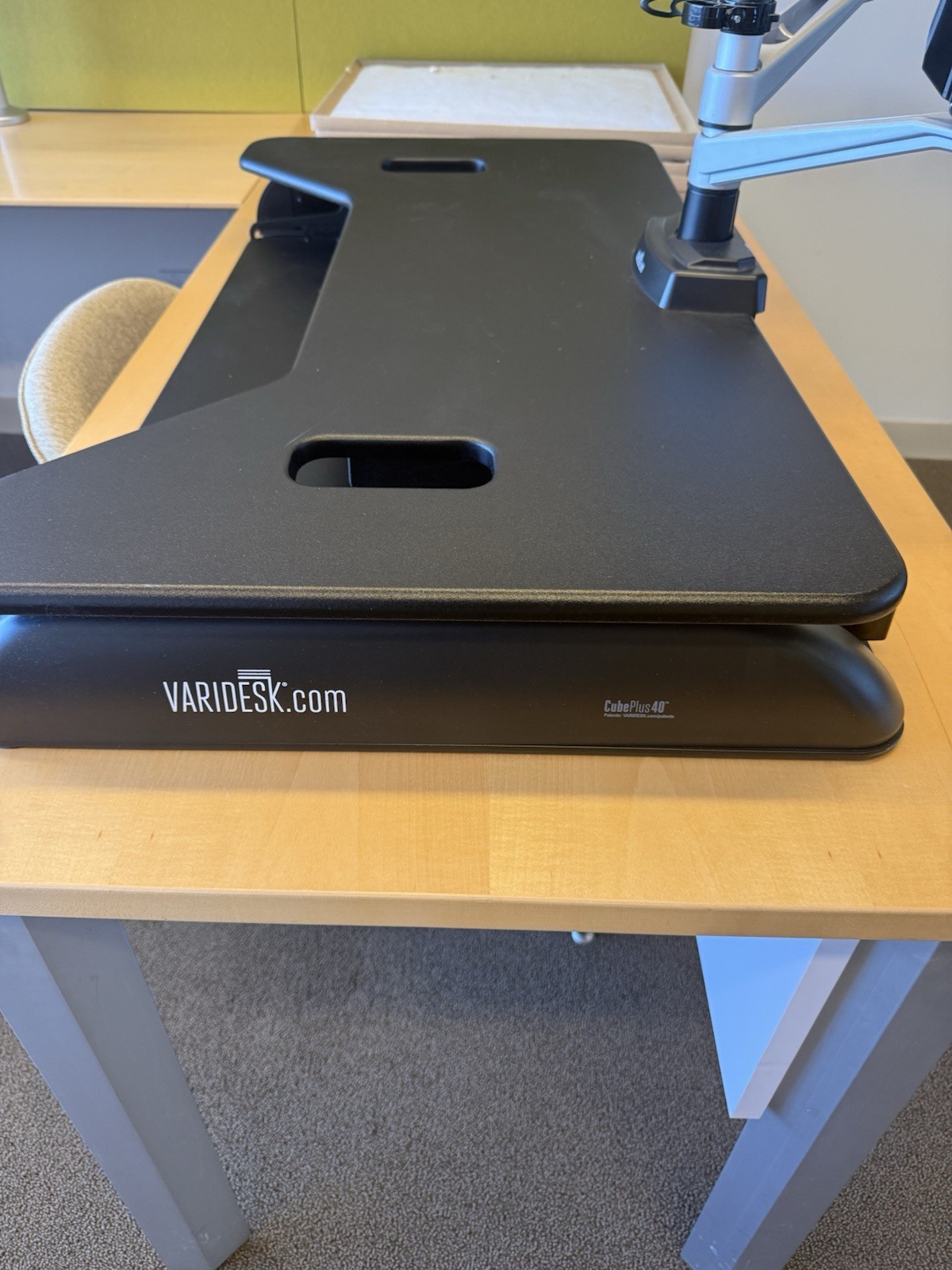 This is a VariDesk Cube Plus 40 standing desk converter in black